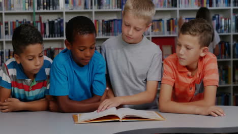 in school library, children reading book together with animation text overlay