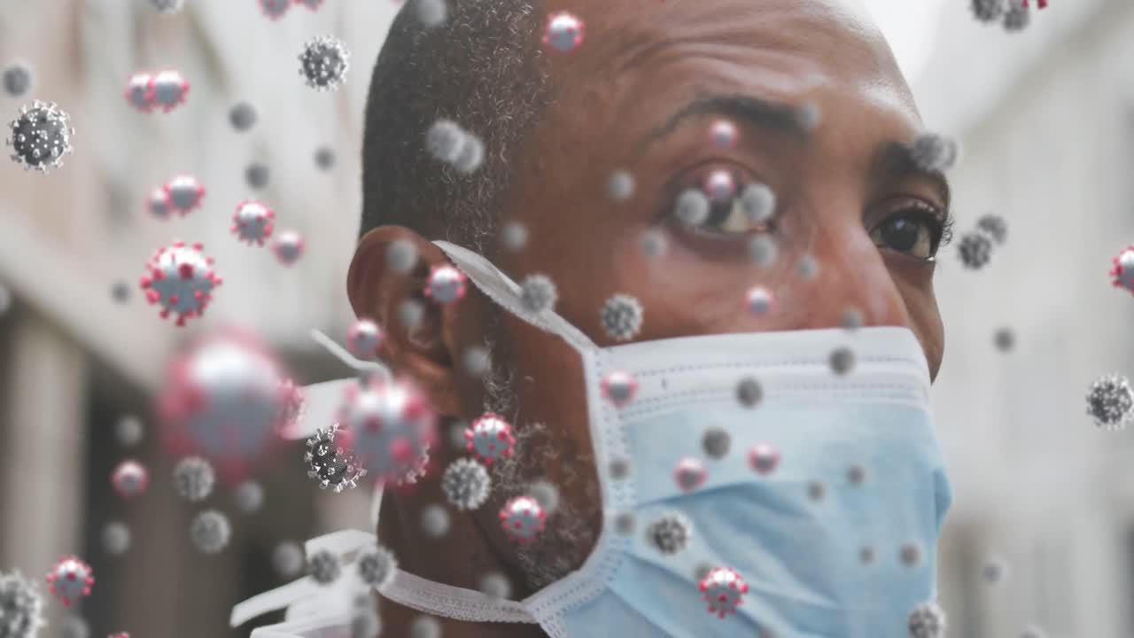 animación de células de covid-19 sobre un hombre que usa una máscara facial