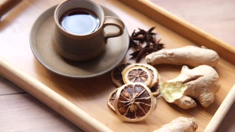 herbal tea with ginger and dried lemon