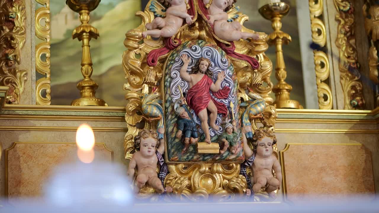 Statues of Saints and Angels on the Ornate Altar of a Portuguese Catholic Church