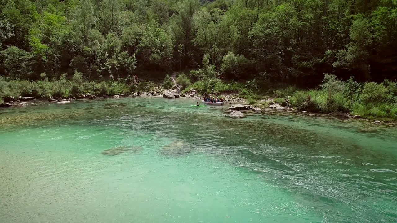 Aerial view of rafters at the Soca river's shore in Slovenia.
