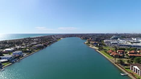 Aerial-View-Of-The-Picturesque-West-Lakes-In-Tennyson,-Adelaide,-South-Australia---wide-shot