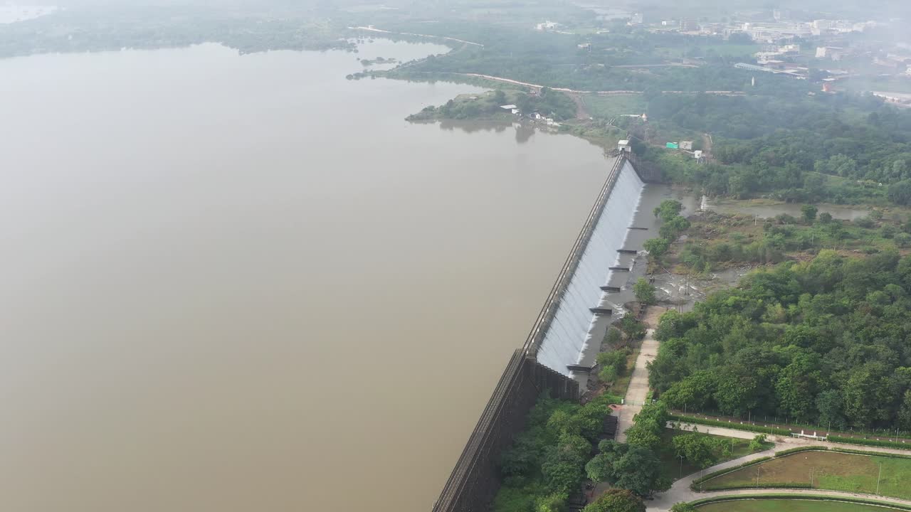aerial view of a river with a bridge