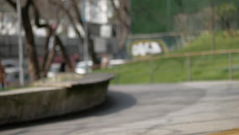 child swinging in a city park