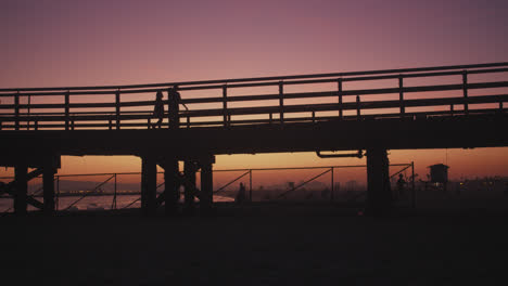 sunset in slo-mo at the seal beach pier