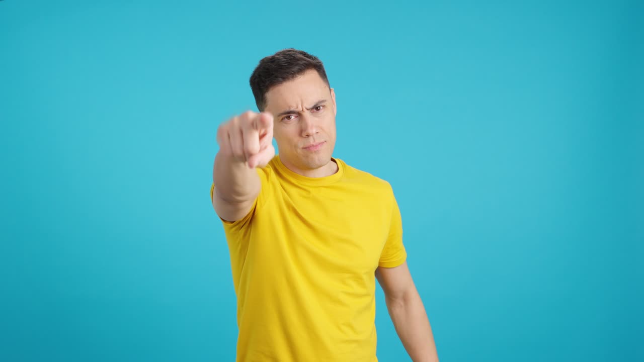 Man gesturing on a blue background