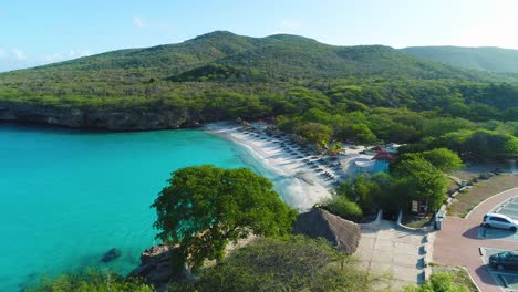 drone overview of grote knip, empty beach and parking lot on island of curacao