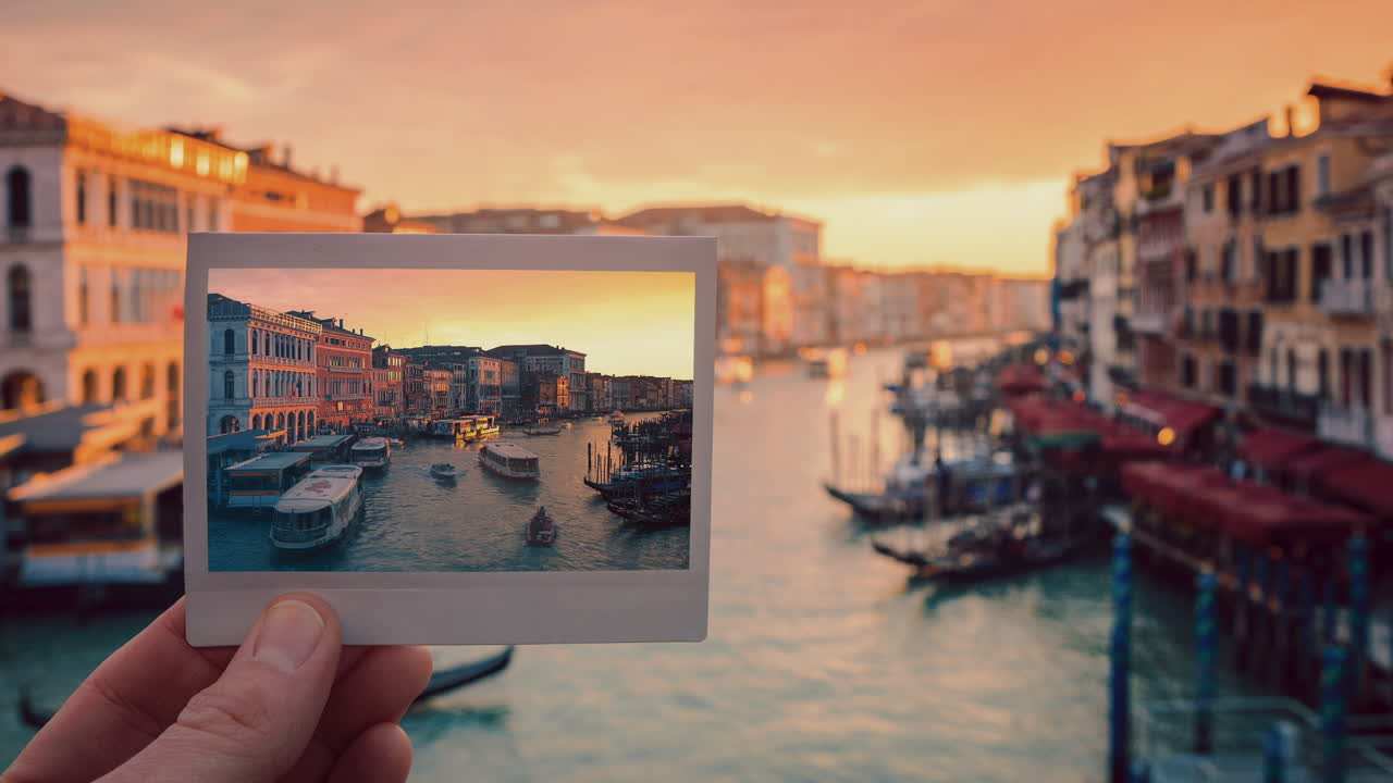 Cinemagraph of Venice, sunset with polaroid showing moving water and boats. Rialto Bridge time-lapse
