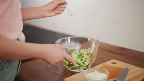 making a cucumber salad