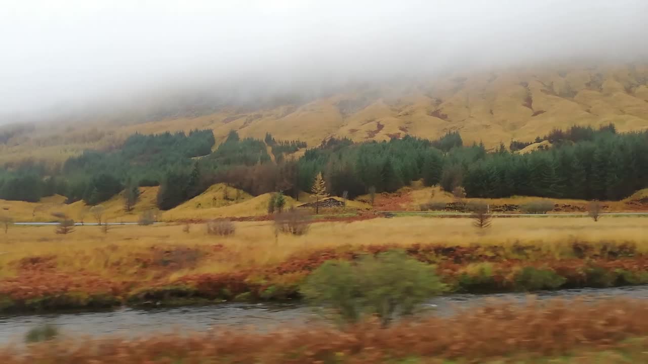 A beautiful scottish landscape, taken by the train. Beautiful color and mist