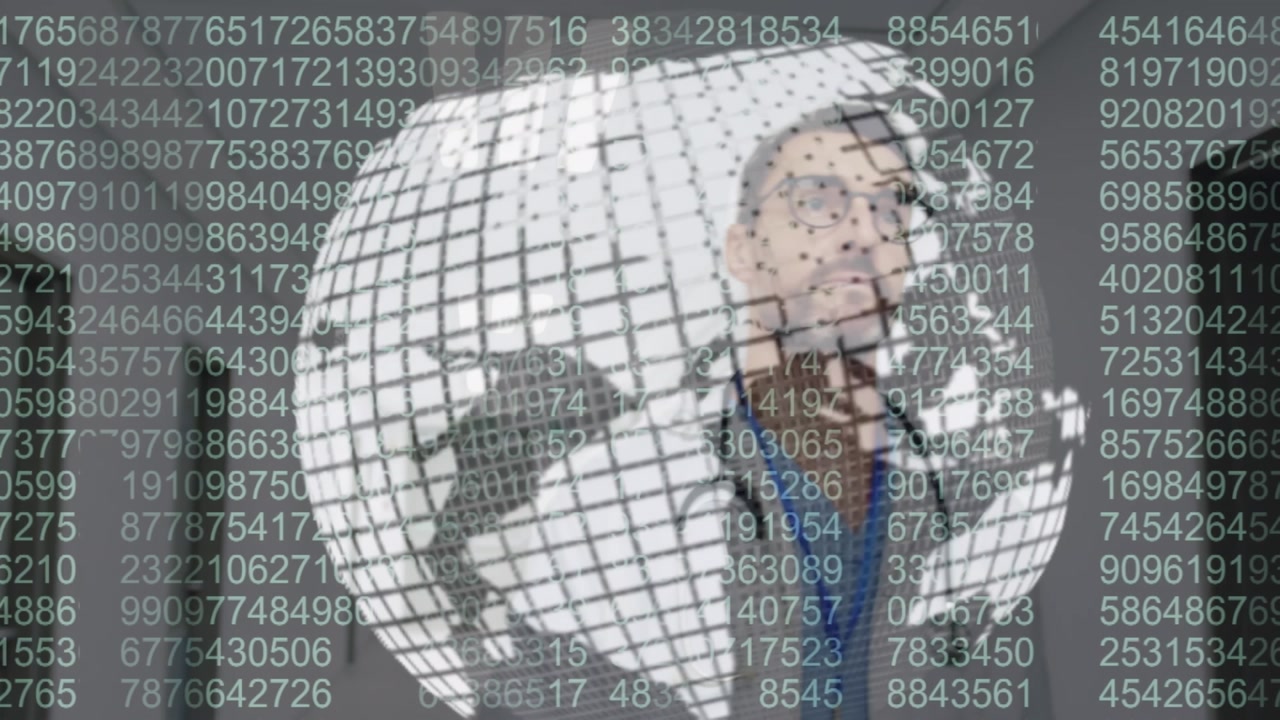Spinning globe and binary coding over caucasian male doctor walking in hospital corridor