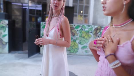 two young women in urban setting