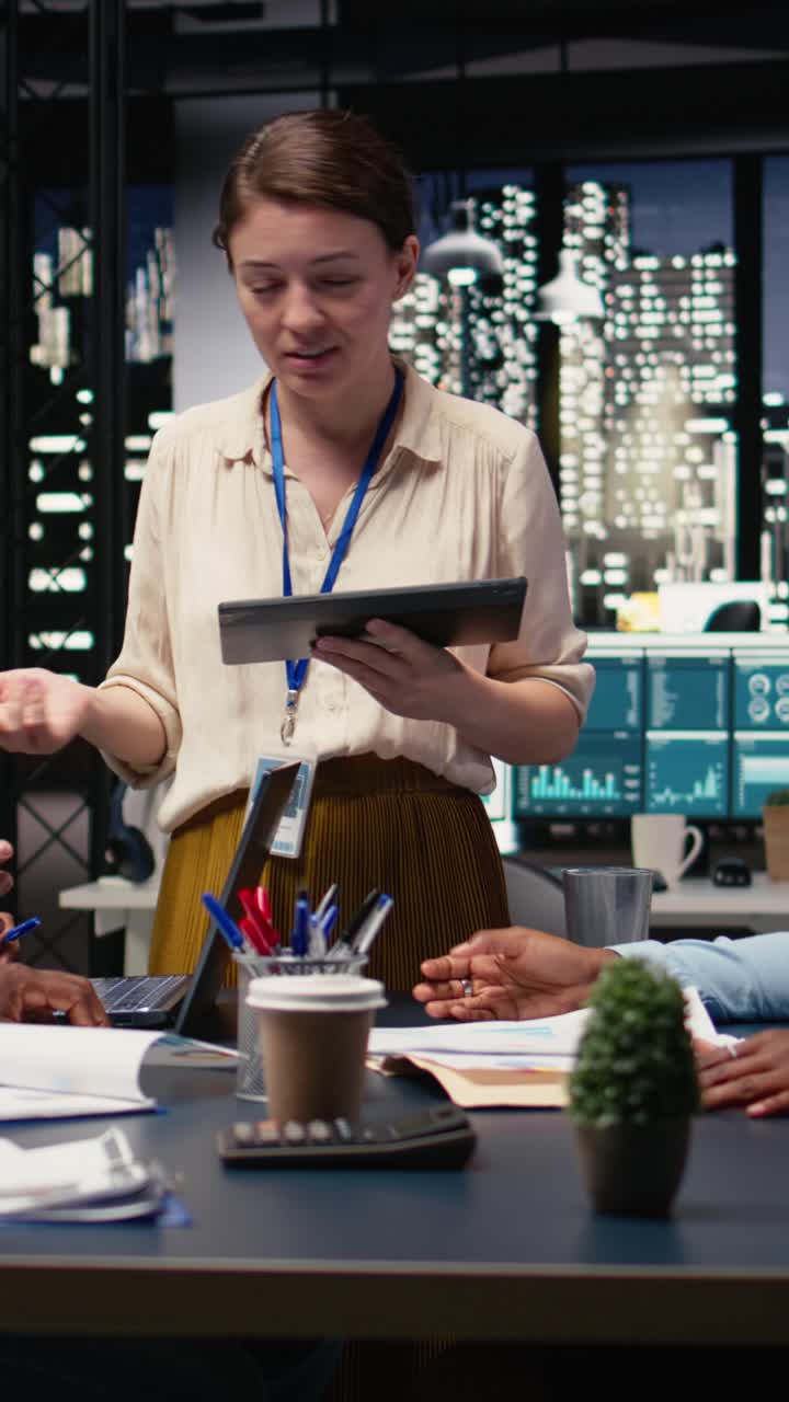 Vertical Video Office management executives doing business meeting