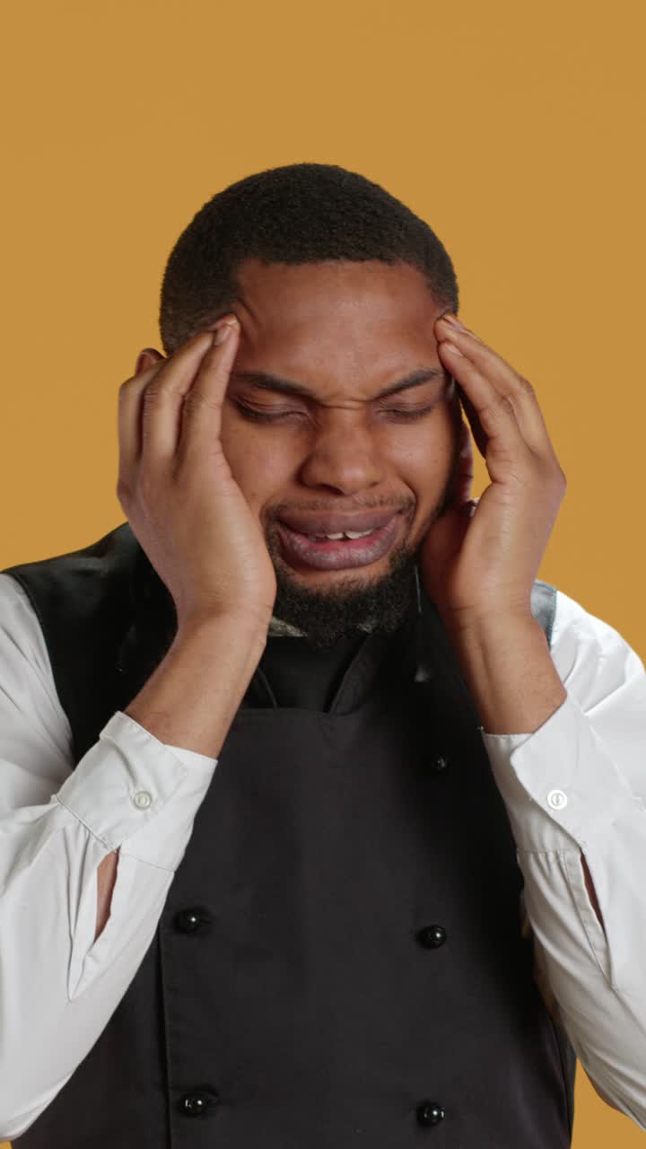 African American Chef Suffering from Severe Headache and Migraine
