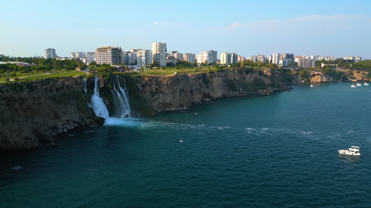 4K Cinematic aerial video capturing the unique beauty of Lower Düden Falls where freshwater meets the Mediterranean -Antalya - Turkey_05