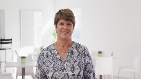 Portrait-of-a-happy-Caucasian-senior-woman-spending-time-before-her-ballroom-dancing-class