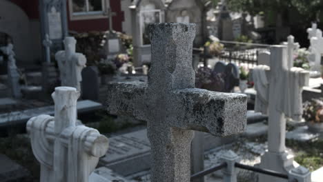 Stone-crosses-mark-graves-at-a-peaceful-cemetery