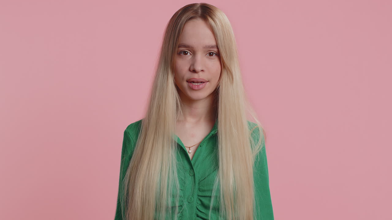 Woman girl say no hold palm folded crossed hands in stop gesture warning of finish prohibited access