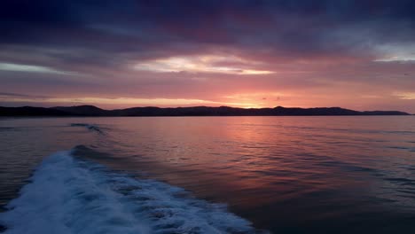 Sunset-Sky,-Sea-And-Mountain-View-In-Spirits-Bay,-New-Zealand---aerial-drone-shot