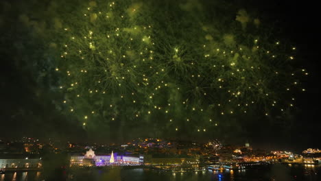 aerial view of fireworks at the coast of terreiro do paco, new years eve in lisbon