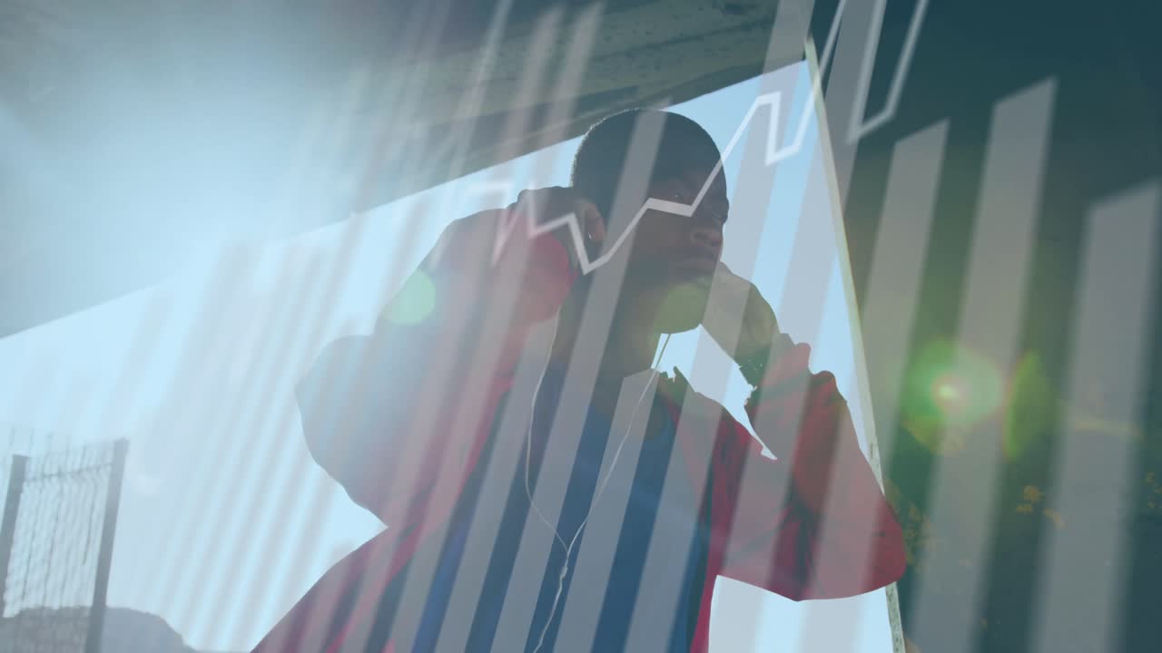 아프리카계 미국인 피트 남자가 야외에서 이어폰을 착용하는 것에 대한 통계 데이터 처리