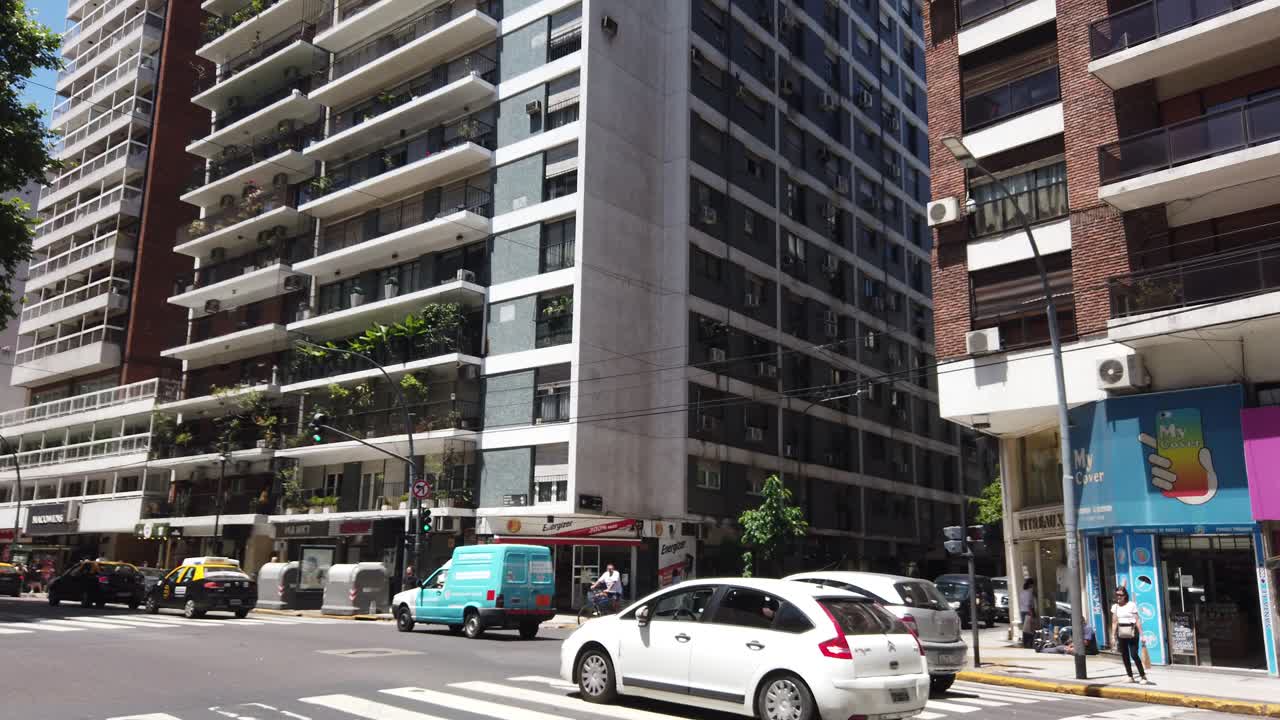Panoramic at Santa fé avenue, traffic and buildings of recoleta neighborhood downtown of buenos Aires city, argentina