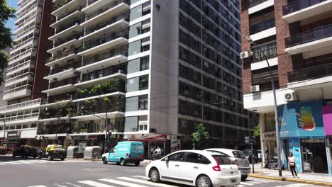 panoramic at santa fé avenue, traffic and buildings of recoleta neighborhood downtown of buenos aires city, argentina