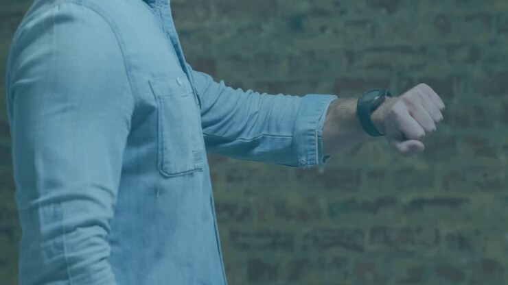 Animation of data processing on screens over caucasian man checking smartwatch