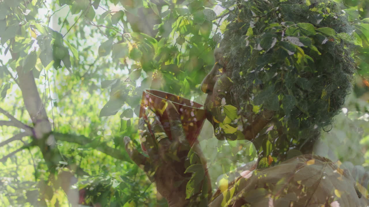 Drinking from cup, person surrounded by lush green foliage in animation