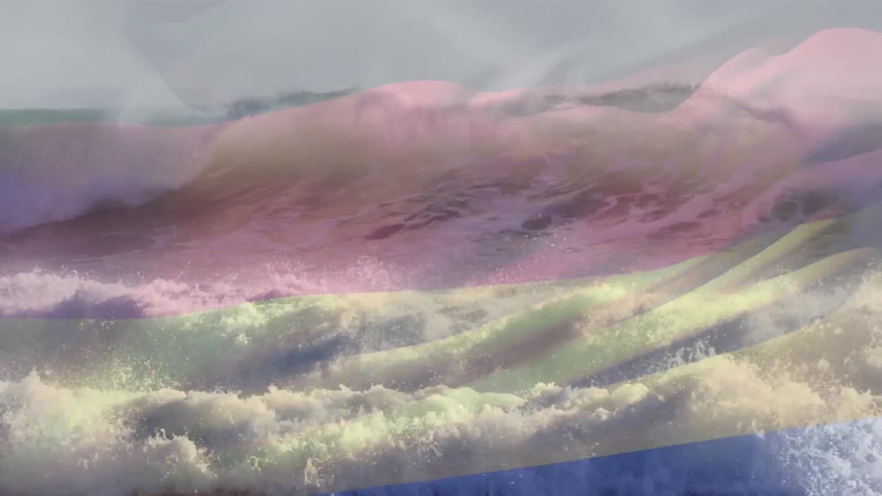 composición digital de la bandera alemana ondeando contra la vista aérea de las olas en el mar