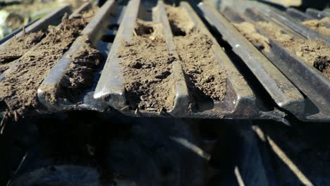 dirty excavator-track in slow motion video