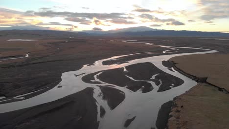 Aerial-Shot-High-Above-Icelandic-Landscape-at-Sunrise