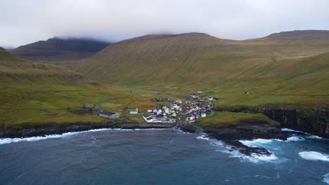 distant drone footage of the gjogv village on the eysturoy island in the faroe islands