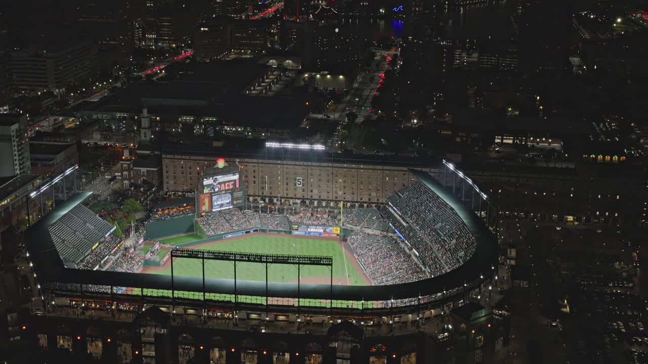 Baltimore Maryland Aerial v61 cinematic birds eye view flyover Pigtown capturing baseball game playing in Oriole Park at Camden Yards at night - Shot with Inspire 3 8k - Sept 28th 2023