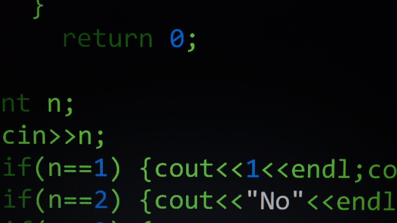 Source code on the monitor screen. Source code