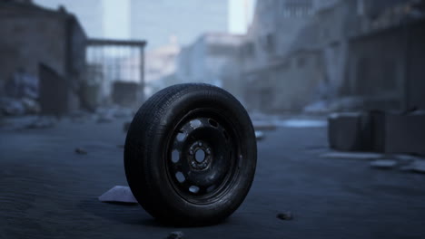 abandoned tire in a desolate urban environment during daylight hours