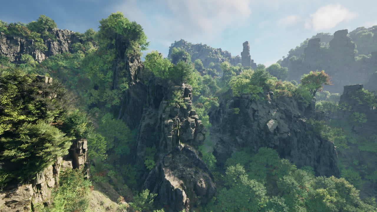 vista aérea de la majestuosa cordillera con bosques exuberantes y acantilados dramáticos