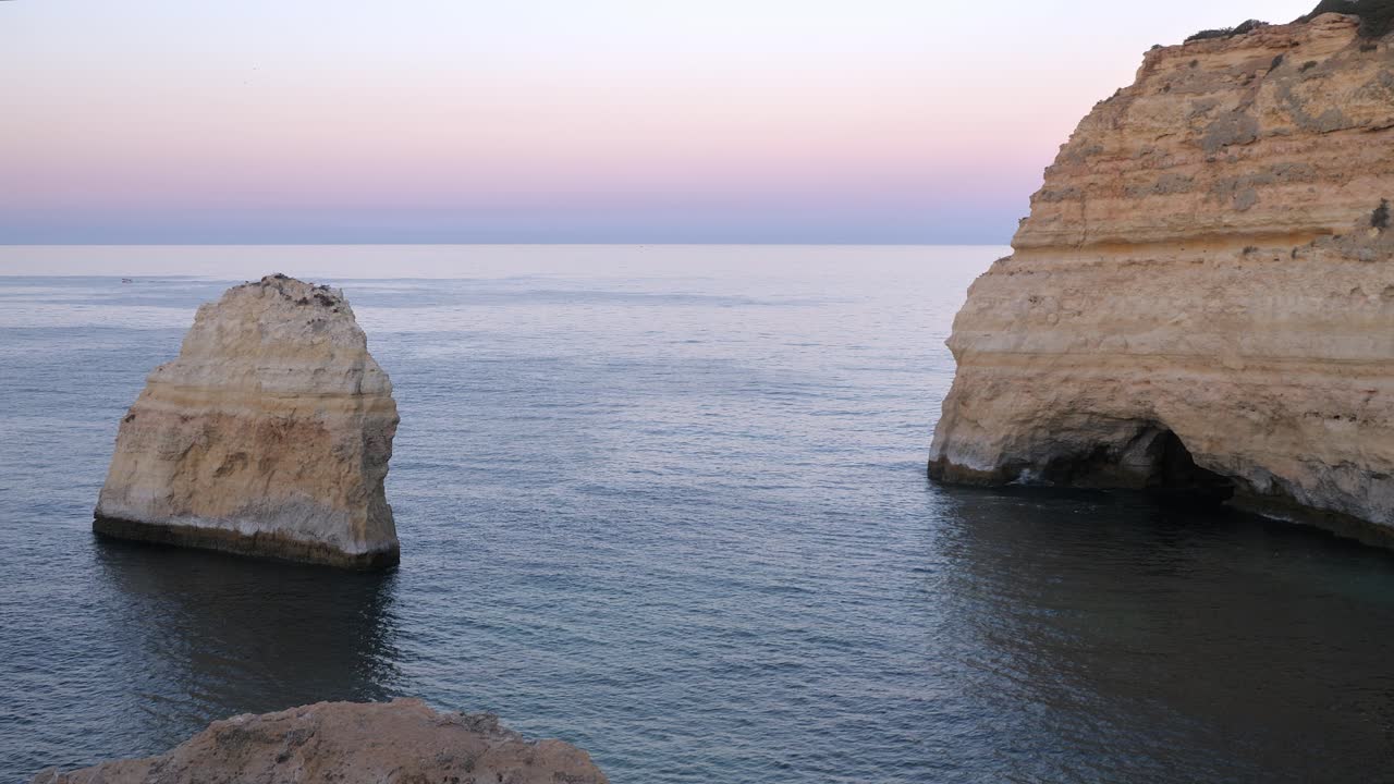 Praia do Carvalho, calm sea from cliff top early morning before sunrise