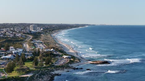 aerial drone view of trigg beach looking down the coast towards scarborough in western australia