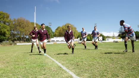 rugby players tackling during game 4k