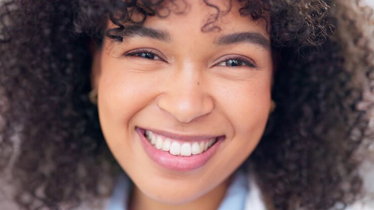 Happy female pharmacist smiling