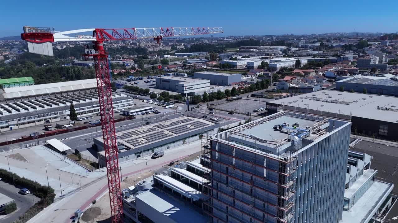 Construction Site with Crane and Modern Building