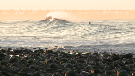 Pan-of-a-wave-breaking-at-Surfers-Point-in-Ventura-California