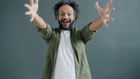 happy man reaching out