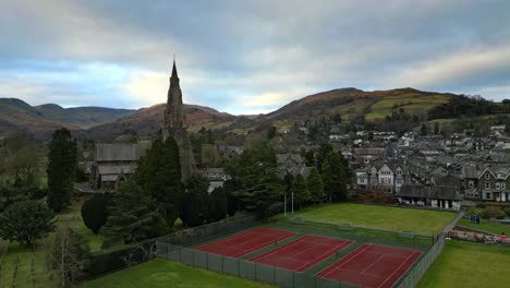 aerial footage of ambleside the lakeland town and former civil parish, now in the parish of lakes, in cumbria, in north west england 2023