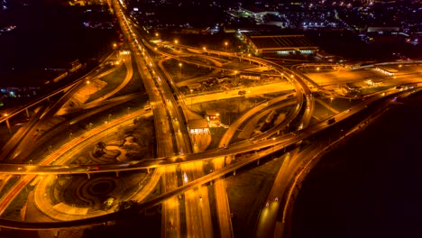 4k aerial hyperlapse. traffic of ring roads, expressways, motorways and highways at night.