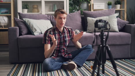 Man vlogging from home