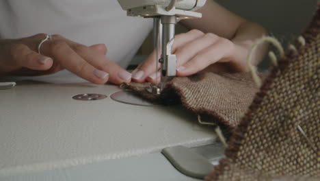 woman sewing with a sewing machine