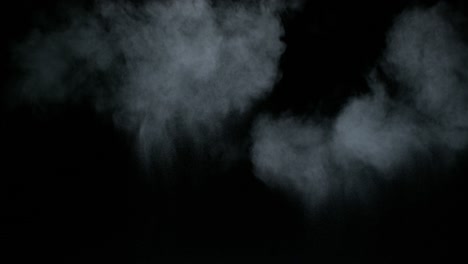 isolated high speed slow motion smoke wisp on black studio background