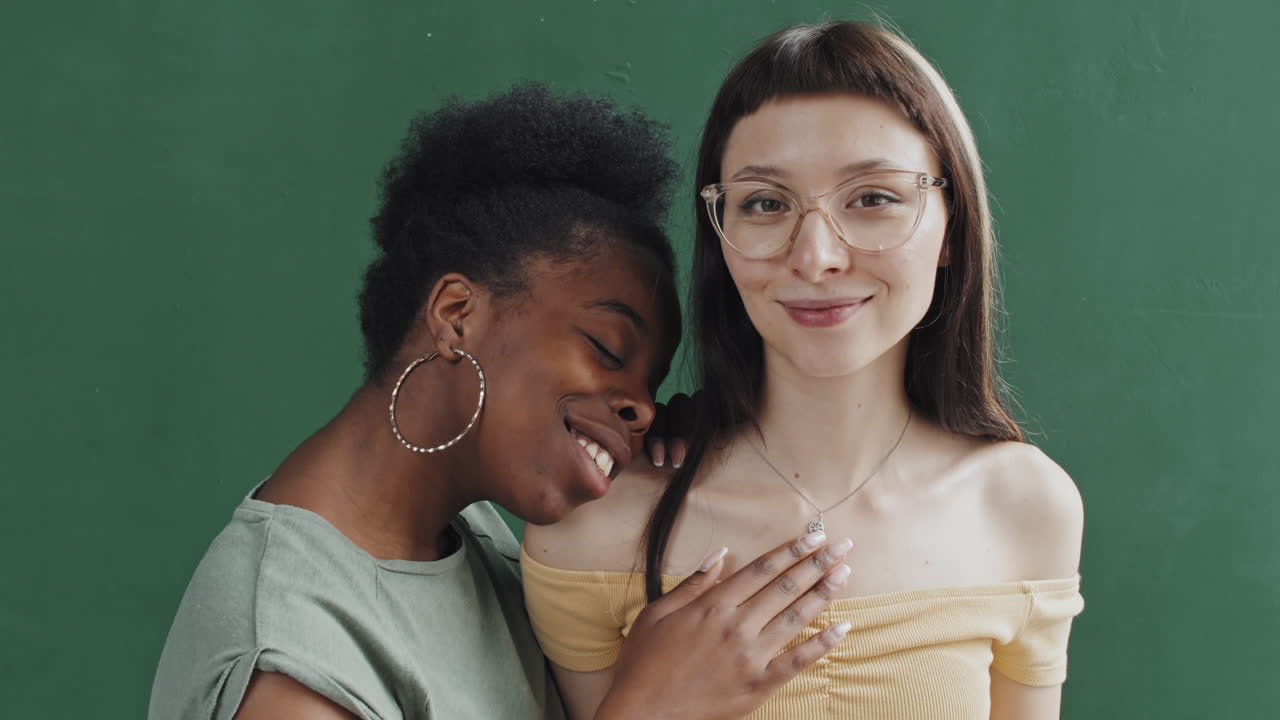 African-American Woman Hugging Girlfriend